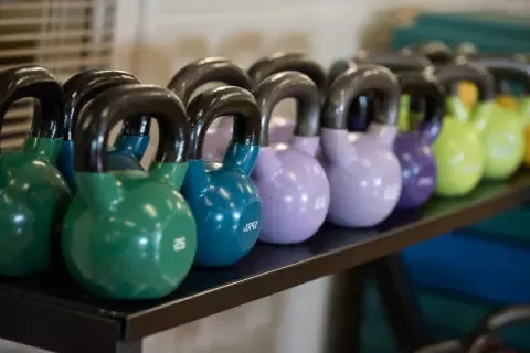 Kettlebell weights on shelf